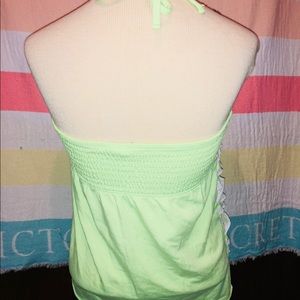 Very cute tank top ! Ties around neck!